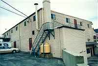 Exterior is clapboard over energy conserving rigid board insulation